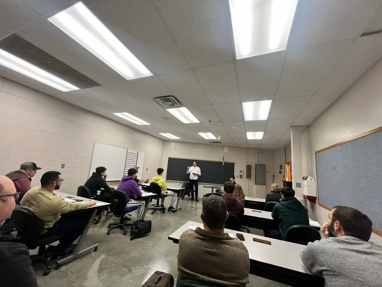 FlyTech Pilot Academy aircraft parked on runway at sunset