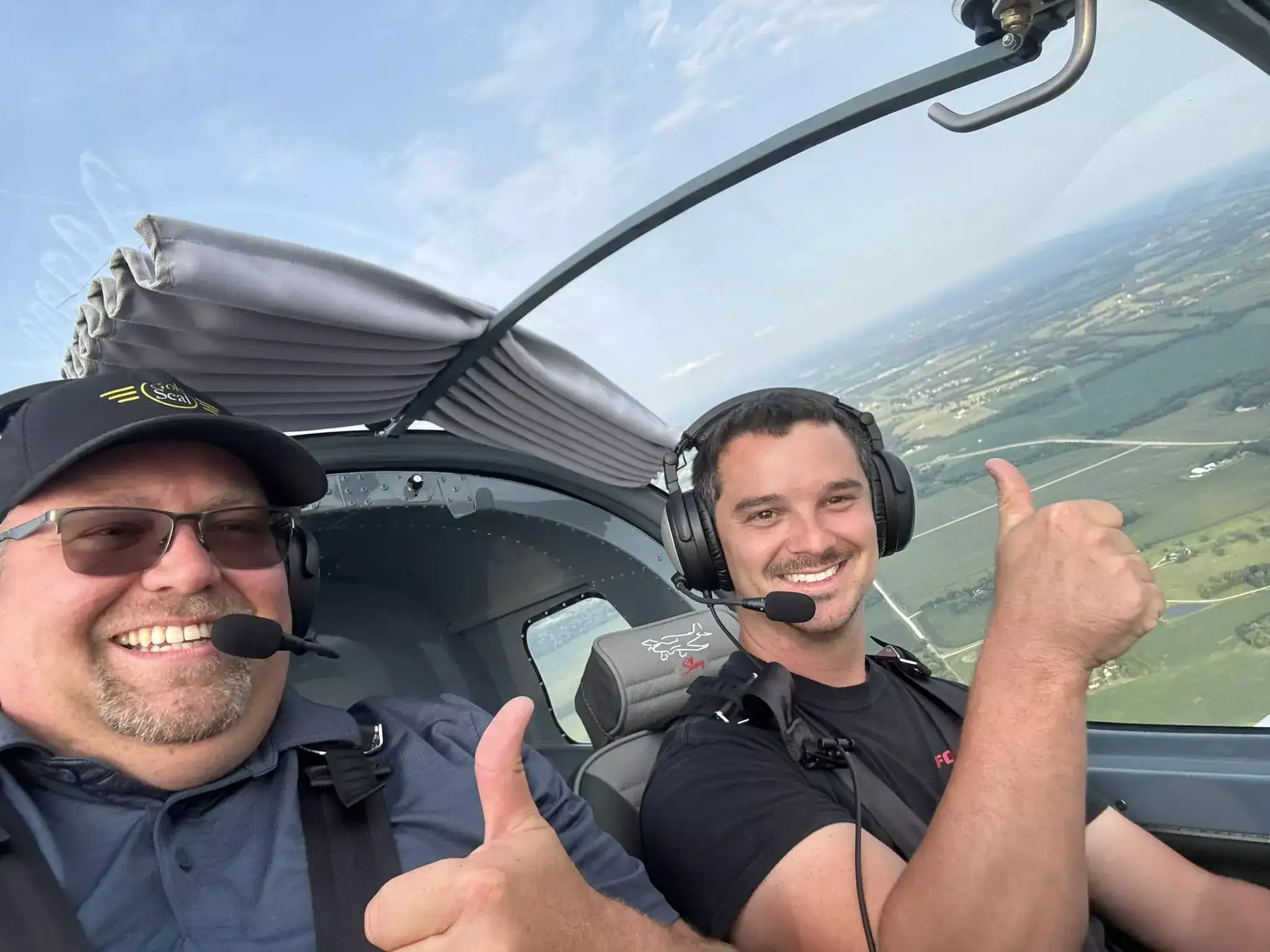 Cessna 172 parked at Speedway Flight Training during sunset