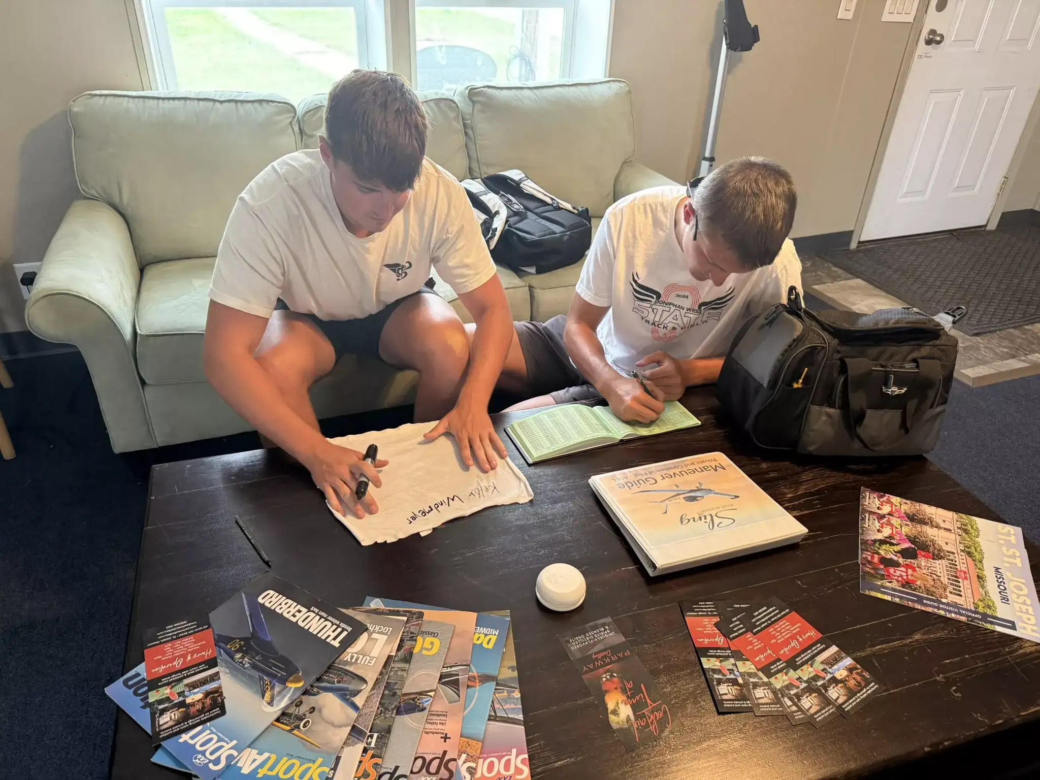 Student pilot and instructor reviewing FAQ documents