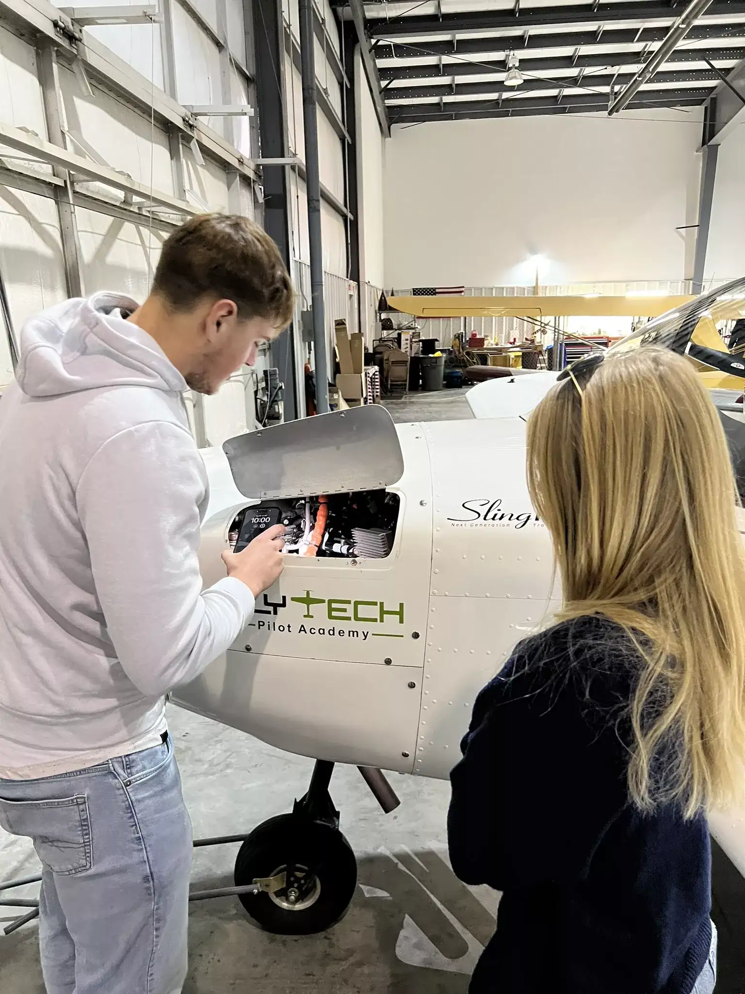 FlyTech Pilot Academy student and flight instructor in a Cessna airplane cockpit